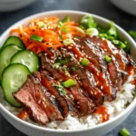 Korean BBQ Steak Rice Bowls with Spicy Cream Sauce are a delightful fusion of flavors that encapsulate the vibrant tastes of Korean cuisine, bringing a mouthwatering experience right to your table. This dish features tender, marinated flank steak served over a bed of fluffy rice, complemented by the crunch of fresh vegetables and the tangy kick of kimchi, all topped with a rich and spicy cream sauce that elevates each bite. Whether you're planning a dinner party to impress your guests or seeking a quick yet satisfying weeknight meal, this recipe is sure to become a favorite.