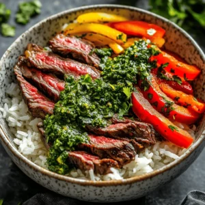Welcome to a mouthwatering journey that brings together the robust flavors of skirt steak and the vibrant freshness of chimichurri sauce. Skirt Steak Rice Bowls with Chimichurri Sauce is not just a meal; it's an experience that tantalizes your taste buds and transports you to the bustling streets of Argentina, where this dish has its roots. The rich, savory notes of marinated skirt steak paired with a zesty, herbaceous chimichurri create a harmonious balance that is sure to please any palate.